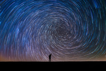 Silhouette Of A Man Pointing At The North Star Vortex Star Trail 