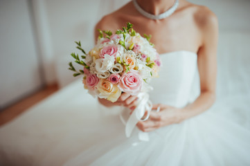 bridal bouquet in hands of the bride