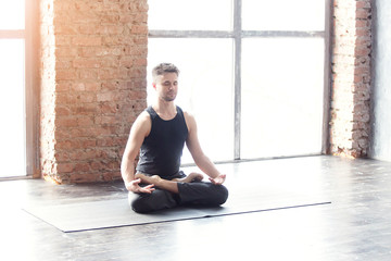 Mexican yoga teacher meditating