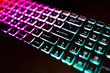 Closeup of colorful illuminated keyboard at night