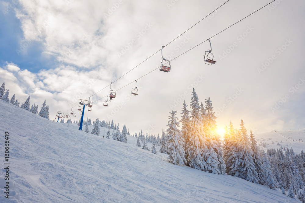 snowboarders on a ski lift Stock Photo | Adobe Stock