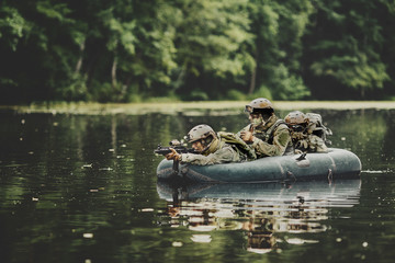 Poster - soldiers in a boat sailing ahead