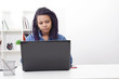 © carballo - woman with the computer laptop at the table of the office, apartment or house