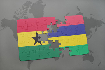 puzzle with the national flag of ghana and mauritius on a world map