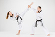 © master1305 - The karate girl and boy with black belts