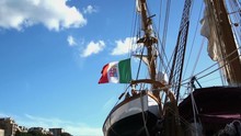 Italian Nautical Flag With Emblem Of Four Maritime Republics, Venice, Genoa, Pisa And Amalfi Flag Flutters In The Wind.