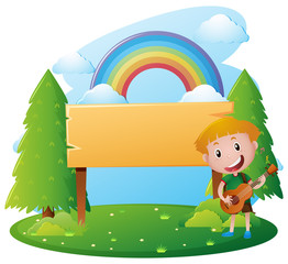 Wall Mural - Wooden sign template with boy playing guitar