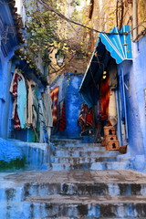  Traders selling their products on a street in Chaouen, Morocco