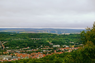 Poster - View of modern city and green trees