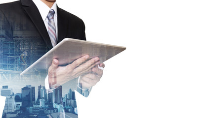 Businessman working on digital tablet with double exposure Bangkok city, concepts of business development, isolated on white background