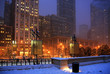 Chicago winter cityscape. Cityscape with snowfall and street lights in the center of Chicago. Beautiful winter night in Chicago, Illinois, USA.