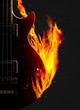 Electronic bass guitar on fire.