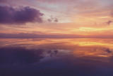 Fototapeta Zachód słońca - evening sky reflected in water
