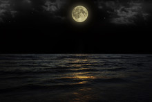 Beautiful Magic Blue Night Sky With Clouds And Full Moon  Stars  Reflexion In Water
