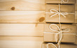 © morissfoto - Rustic parcels gift box with kraft paper.
