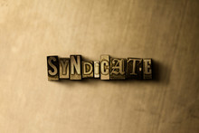 SYNDICATE - Close-up Of Grungy Vintage Typeset Word On Metal Backdrop. Royalty Free Stock - 3D Rendered Stock Image.  Can Be Used For Online Banner Ads And Direct Mail.