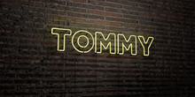 TOMMY -Realistic Neon Sign On Brick Wall Background - 3D Rendered Royalty Free Stock Image. Can Be Used For Online Banner Ads And Direct Mailers..