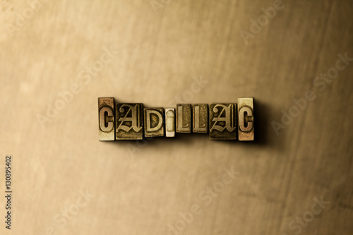Fotografie, Obraz CADILLAC - close-up of grungy vintage typeset word on metal backdrop