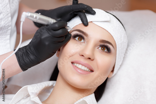 Fotomural Permanent makeup. Tattooing of eyebrows