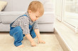 © Africa Studio - Adorable little boy playing in the room, closeup