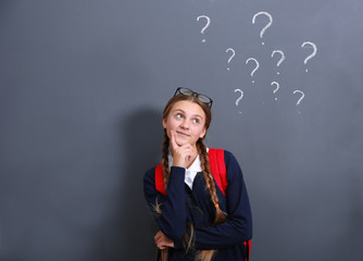 Poster - Teenage girl standing near school blackboard