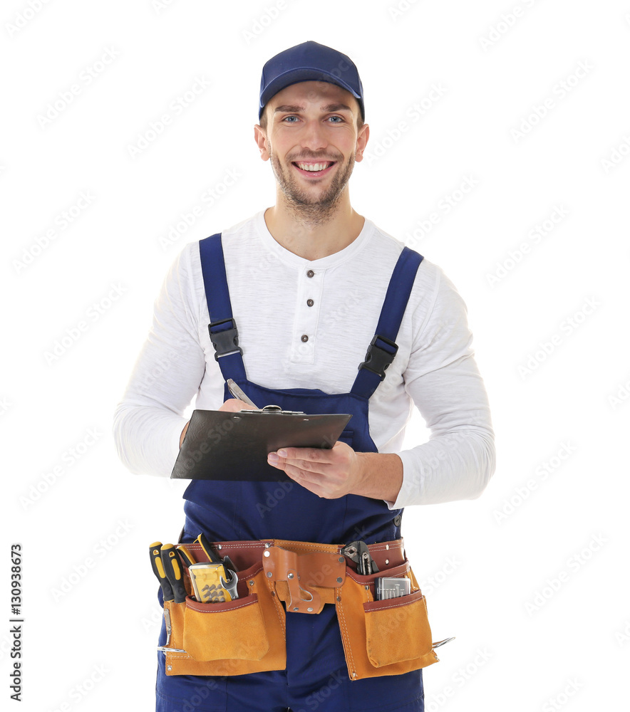 Plumber in uniform holding clipboard on white background