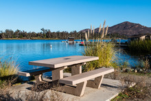 Picnic Table At Lake Murray In San Diego, California With Boat Rental Dock And Cowles Mountain In The Background, 