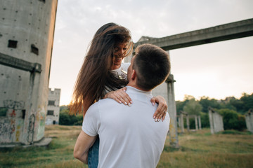 Love couple. Young beautiful couple in love enjoying romantic moment at outdoors. Love story.