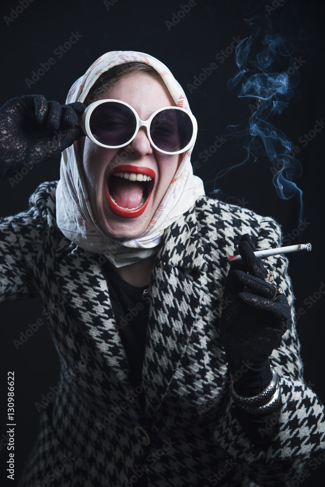 cigarette lady Business Woman Is Smoking A And Wachtes Around Stock Photo, Picture and Royalty Free Image. Image 4828830 Lady With Cigarette Stock Photo