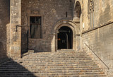 Entrance stone building in the Latin district of Barcelona
