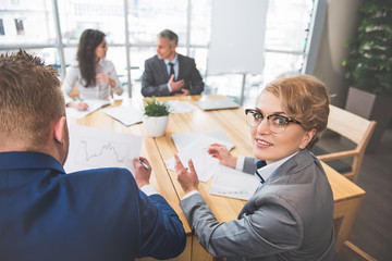 Canvas Print - Concentrated employees are working in office