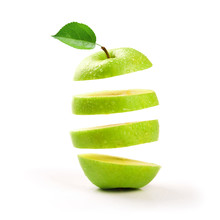 Sliced Green Apple Levitating On White Background
