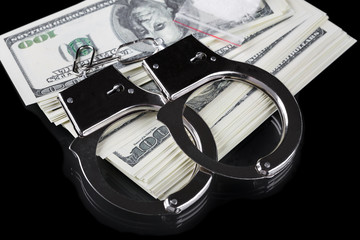 Wall Mural - Handcuffs on stack of dollar banknotes and cocaine