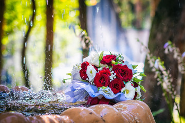 Soaked wedding bouquet of flowers in water