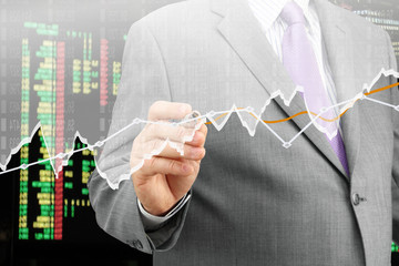 Fototapete - Businessman analyzing financial chart