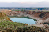 Fototapeta Tęcza - Quarry with lake