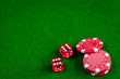 © 279photo - poker chips and dice on green background top view