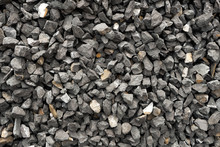 Coarse Aggregate - A Stack Of Gravel / Grit Crushed And Broken At A Stone Pit. The Colors, Sizes And Shapes Are Very Irregular.