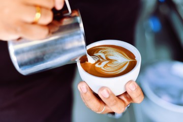 Wall Mural - coffee latte in coffee shop cafe
