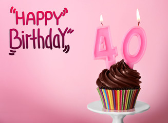 Poster - Cupcake with candles and text HAPPY BIRTHDAY on pink background