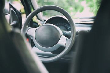 Wall Mural - Steering wheel and dashboard in car