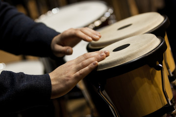 Wall Mural -  Hands musician playing the bongos