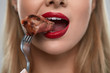 © puhhha - Eating Meat. Closeup Of Sexy Woman's Mouth Biting Tasty Meat