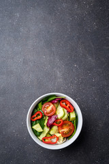 Sticker - Vegetable salad on dark stone table