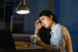 © PR Image Factory - asian business woman drink coffee refreshing working overtime la