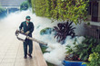 © Songwut Pinyo - Man work fogging to eliminate mosquito for preventing spread dengue fever and zika virus