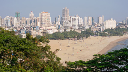 Chowpatty Beach in Mumbai where annual celebrations are held honouring the Hindu elephant god Ganesh. It is the city's largest festival involving people immersing idols of Ganesh in the Arabian Sea