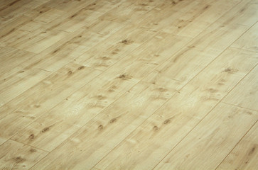 Close up detail of a beautiful wooden brown laminated floor