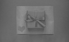 Black White Gift Box On Paper Background