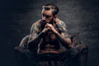 © Fxquadro - bearded male with naked tattooed torso.